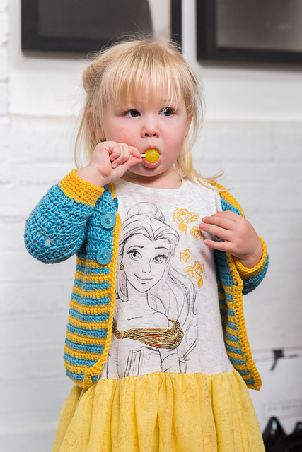 Child's crochet cardigan in blue and yellow stripes